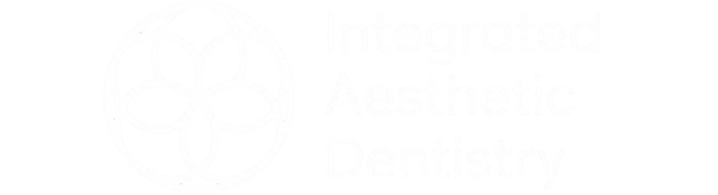 Integrated Aesthetic Dentistry white logo