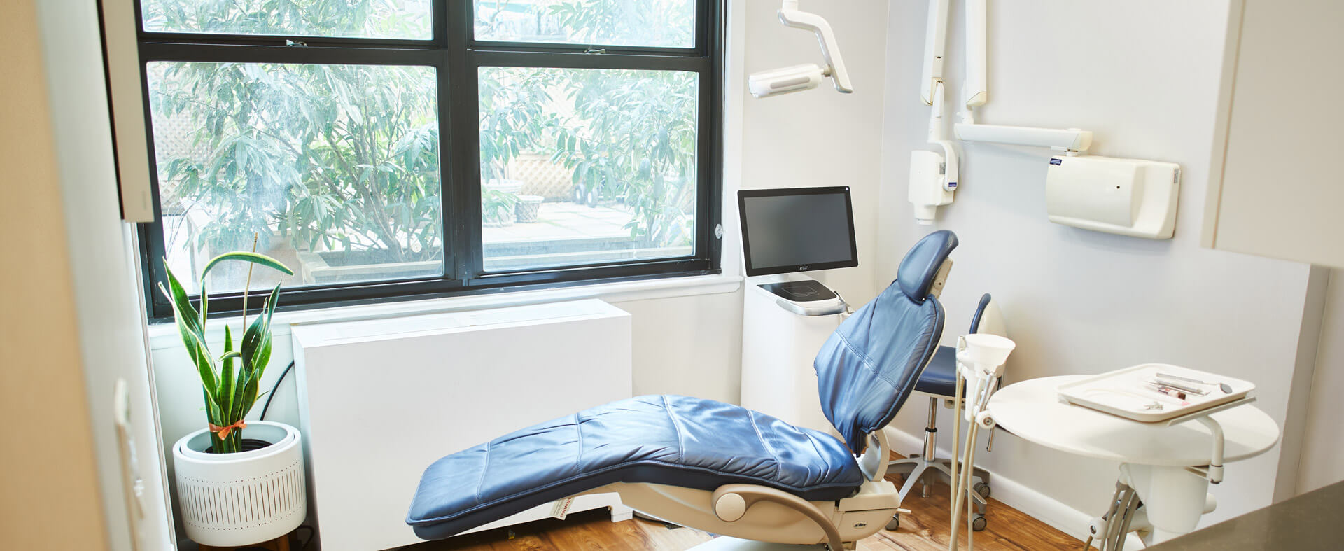 Bright dental treatment room with modern equipment