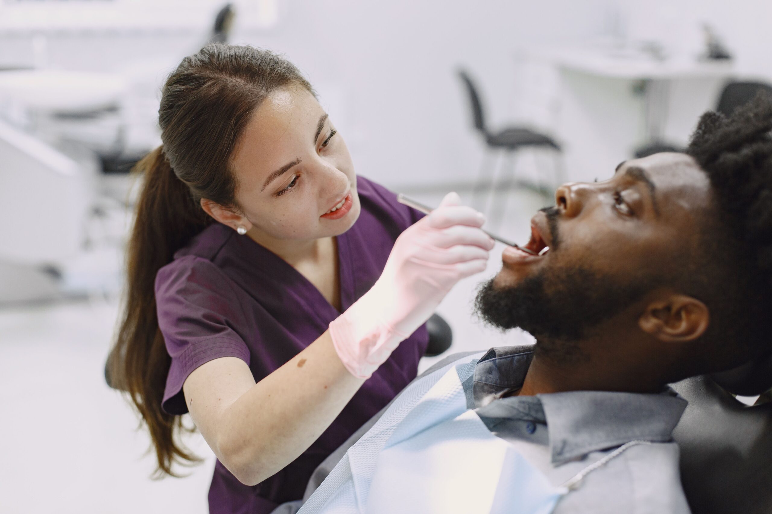 Dentists reviewing imaging with a patient at Integrated Aesthetic Dentistry
