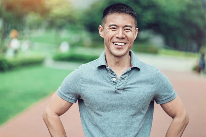 Smiling male patient outdoors