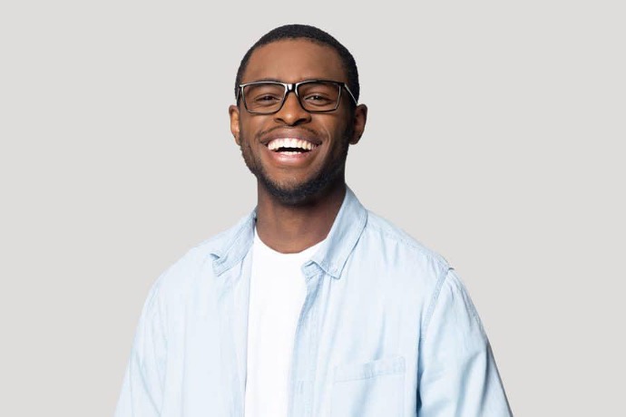 Smiling male patient wearing glasses