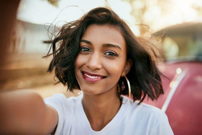 Smiling female patient outdoors