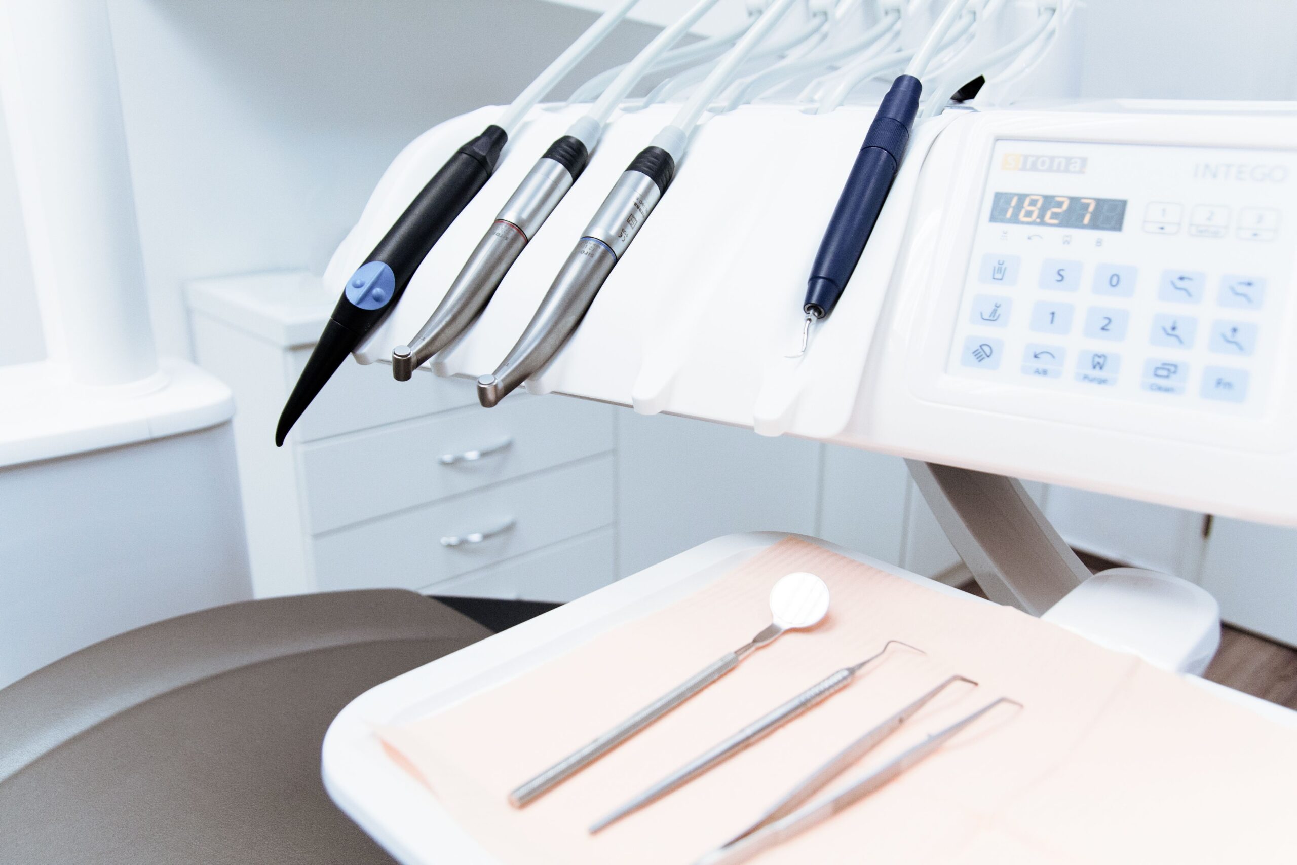 Dentists reviewing imaging with a patient at Integrated Aesthetic Dentistry