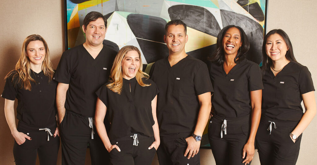 Integrated Aesthetic Dentistry dental team portrait